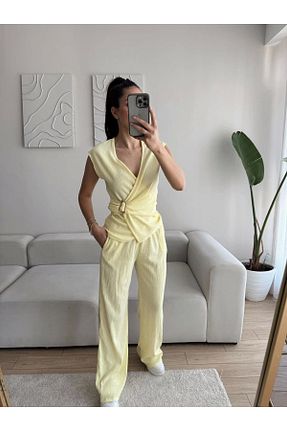 ست بالاتنه و پائین تنه زرد زنانه بافتنی Zoom Butik - کد 943867458