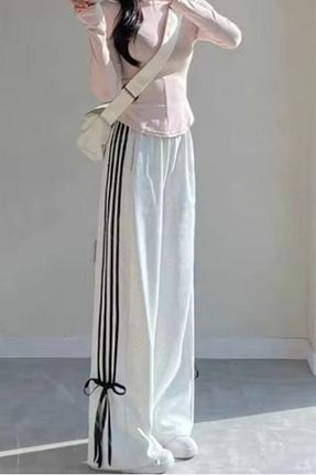شلوار کرمگن سفید زنانه رگولار The Champ Clothing - کد 943679778