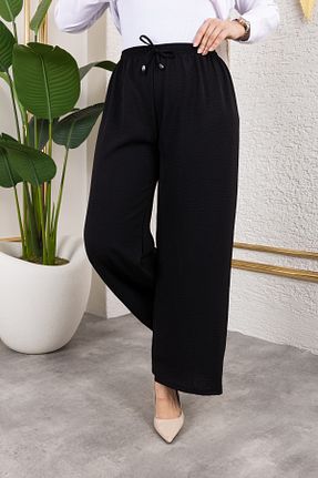 شلوار مشکی زنانه پنبه ای Nevayla Moda - کد 955740995