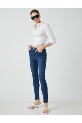 شلوار جین سرمه ای زنانه پاچه تنگ فاق بلند پنبه (نخی) استاندارد کد 287077397