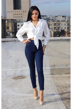 شلوار جین آبی زنانه پاچه تنگ فاق بلند جین ساده کد 378824402