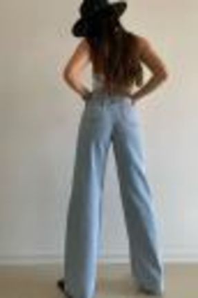 شلوار جین قهوه ای زنانه پاچه گشاد فاق بلند جین ساده جوان کد 471689235