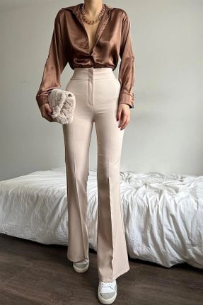 شلوار بژ زنانه فاق بلند جین پاچه گشاد راحت کد 663291791
