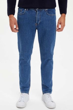 شلوار جین آبی مردانه پاچه تنگ پنبه (نخی) استاندارد کد 46833293