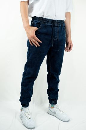 شلوار جین آبی مردانه پاچه کش دار اورسایز بلند کد 732700324