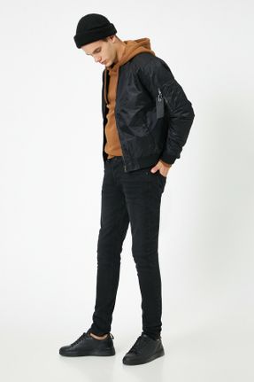 شلوار جین مشکی مردانه پاچه لوله ای پنبه (نخی) استاندارد کد 33268710