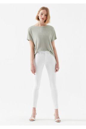 شلوار جین سفید زنانه پاچه ساده فاق بلند پنبه - پلی استر - الاستن کد 101088685