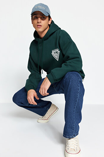 Trendyol Collection Πράσινη κουκούλα Oversize/Wide Cut College εμπριμέ βαμβακερή φούτερ με φλις εσωτερικά TMNAW24SW00063