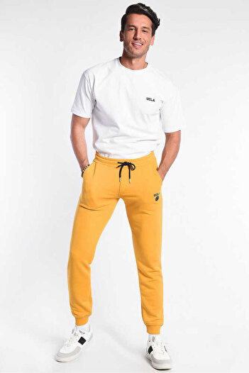 UCLA Ανδρικό αθλητικό παντελόνι Yellow Luskın Printed Standard Fit - Συρρικνούμενη εφαρμογή