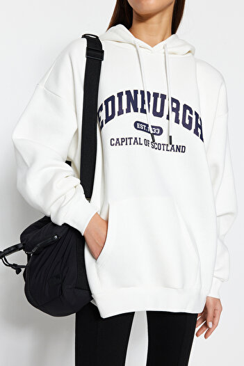Trendyol Collection Ecru Thick Fleece Inside City Printed Oversize/Wide Fit Hooded Knitted Sweatshirt TWOAW24SW00438