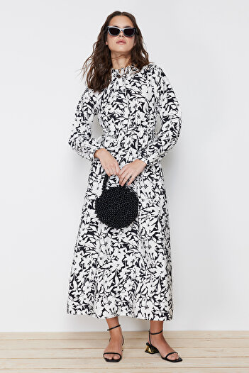 Trendyol Modest Černé květinové tkané šaty TCTSS24EB00047