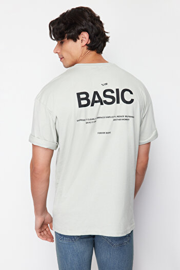 Trendyol Collection Γκρι Oversize/Wide Cut Crew λαιμόκοψη με γράμματα στην πλάτη εμπριμέ 100% βαμβακερό πλεκτό T-shirt TMNSS23TS00263