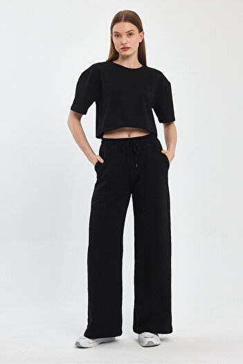 Penyelux Black Women's Palazzo Trousers - Pockets, Rubber Waist, 2 Strings Fabric