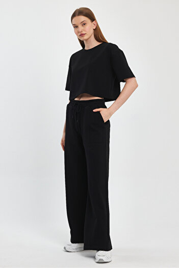 Penyelux Black Women's Palazzo Trousers - Pockets, Rubber Waist, 2 Strings Fabric