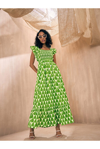 Sassafras By Styli All Over Print Tie-Up Back A-Line Maxi Dress