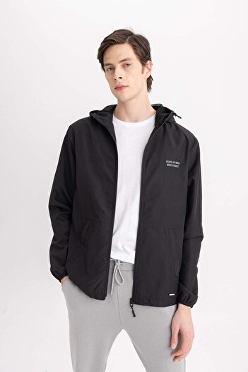 DeFacto Pláštěnka Slim Fit s kapucí z umělé kožešiny