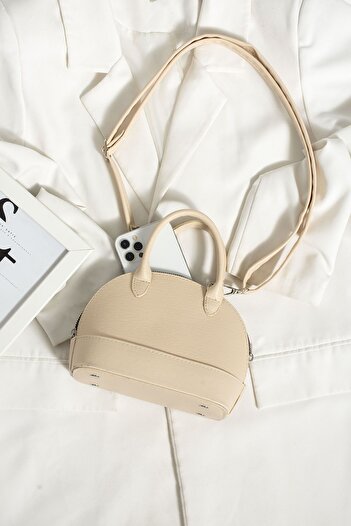 ESTUTE D model mini bottle crossbody box