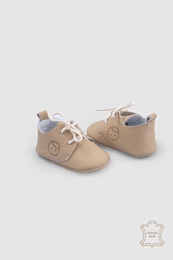 Little Gusto Beige Leather Baby Booties - Tie-up Design