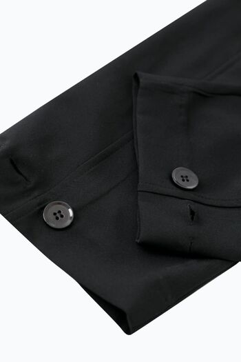 Puane Pleated Carrot Trousers with Button Detail
