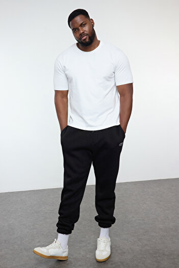 Trendyol Collection Plus Size Black Oversize/Wide Cut Pocketed Label Loose Sweatpants Tmnaw25Aj00001