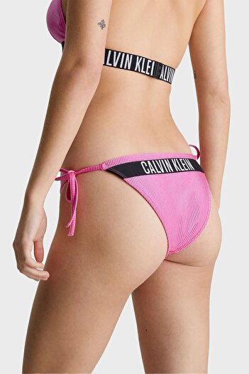 Calvin Klein Logolu Fitilli Yandan Bağlamalı Bikini Altı KW0KW02390TOZ  BİKİNİ ALTI KW0KW02390