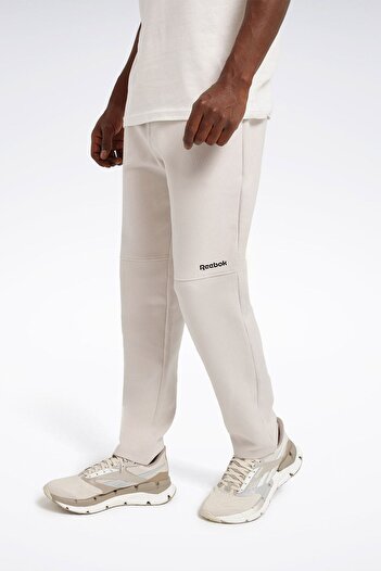 Reebok TUKAN TRACK PANTS Γκρι ανδρικό αθλητικό παντελόνι