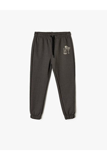 Koton Παντελόνι Jogger με δέσιμο στη μέση με λεπτομέρεια City Print