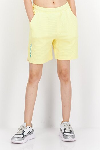 Puma Women Sportswear Fit Plain Training Shorts, Yellow