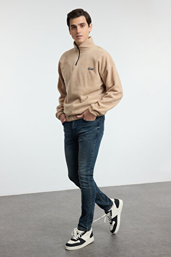 Trendyol Collection Темно-сині вузькі джинси з еластичної тканини TMNSS21JE0067