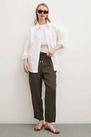 Never more Khaki Colored Pipe Leg, Elastic Waist Trousers