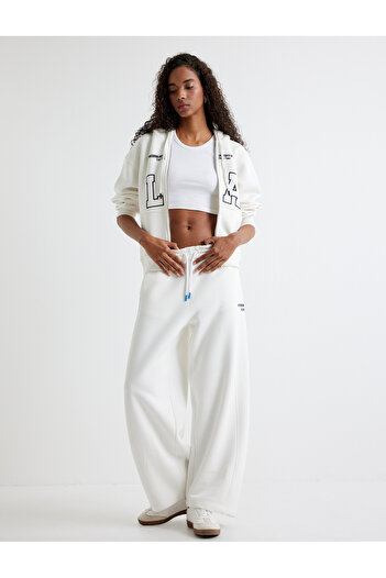 Koton Pantaloni de sport largi, drepti, cu buzunare legate în talie