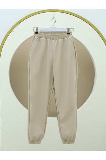Modamorfo Beige Elastic Leather Trousers with Pockets