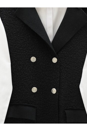 Modamorfo Buttoned double pocket boucle vest - black