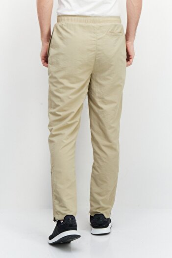 Fila Men Tapered Fit Tettnang Drawstring Outdoor Track Pants, Tan