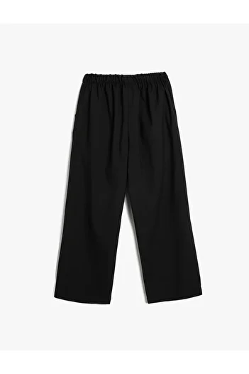 Koton Wide Leg Trousers with Pocket Detail and Tie Waist