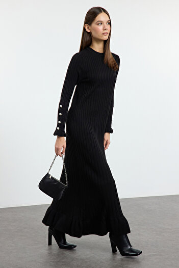 Trendyol Modest Μαύρη φούστα με βολάν με ριμπ πλεκτό φόρεμα TCTAW25EB00016
