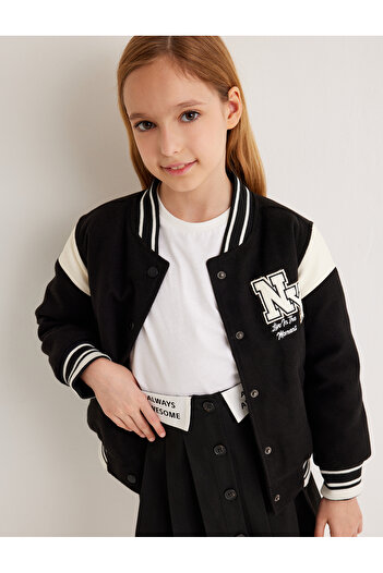 Koton Langärmlige, farbblockierende, übergroße College-Jacke mit Taschendetail