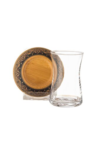 Dania A tea set of 6 clear glass tea cups and 6 wooden saucers with distinctive modern engravings
