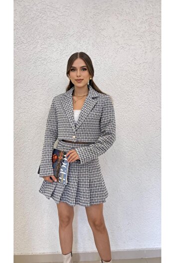 MODA Жіночий темно-синій шовковий короткий піджак і спідниця з воланами