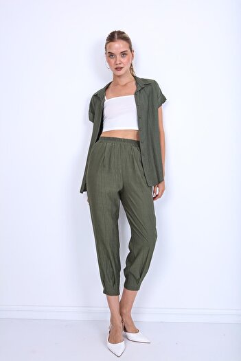 Vitrin Pleated Carrot Trousers