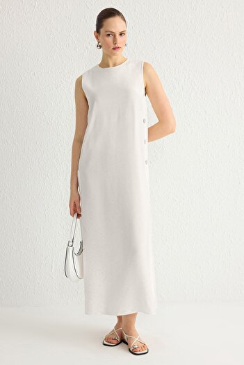 Trendyol Modest Μπεζ φόρεμα με λεπτομέρεια υφαντό εσώρουχο TCTSS25EB00007
