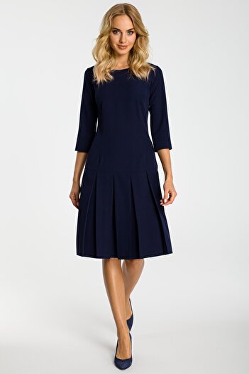 Made of Emotion Choose this short-sleeve drop waist dress with adorable pleats for a girlish elegant look.
