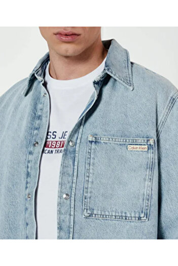 Calvin Klein Erkek Regular Fit Çentikli Yaka Düğme Kapamalı Cep Detaylı Denim Mavi Gömlek J30J327021-1AA