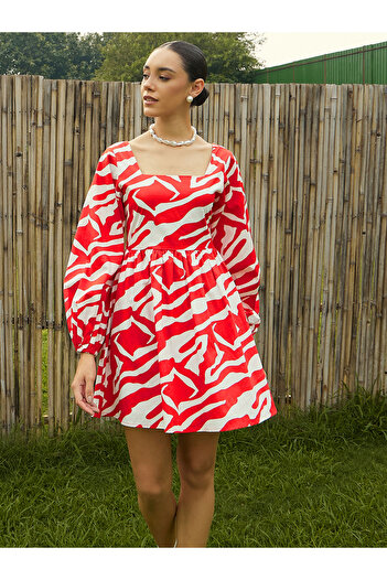 Sassafras By Styli All Over Print Back Tie Knotted Flare Mini Dress