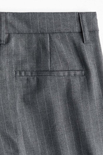 H&M Belted tailored trousers