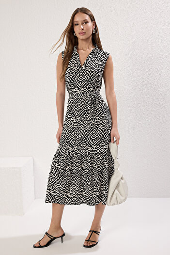 Trendyol Collection Černé geometrické tištěné sukně s výstřihem do V s volánky Midi pletené šaty TWOSS25EL00703