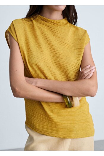 MANGO Woman Textured asymmetrical blouse