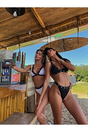 LU Lunita Black Triangle Back Brazilian Hidden Seam Elastic Removable Cap Bikini Suit