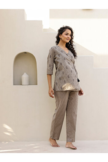 Sanskrutihomes By Styli All-Over Print Wrap Top with Striped Trousers Co-Ords