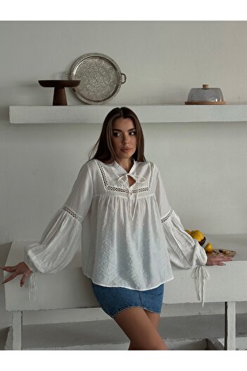 BELLA FASHION Embroidered Blouse with Lace-Up Collar